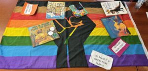 Pride flag and books