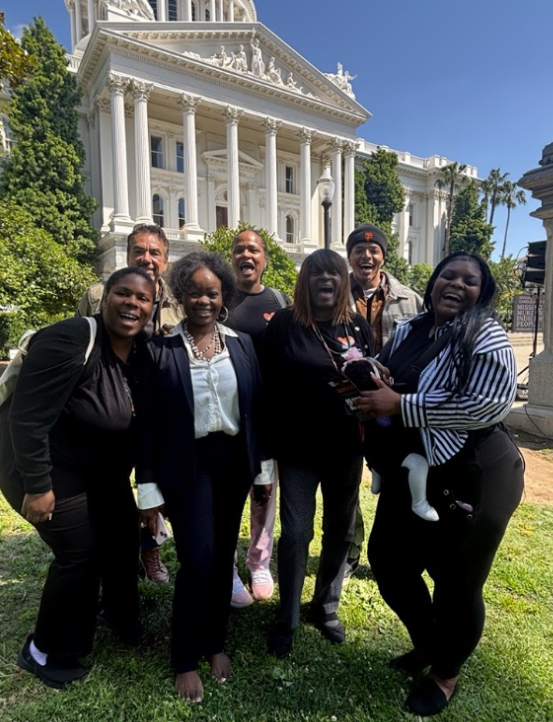 justice academy members outside state capitol